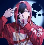  1boy asymmetrical_bangs black_hair chain chain_necklace commentary drawstring finger_gun finger_gun_to_head gold_chain green_eyes hair_between_eyes hand_up heterochromia holding holding_microphone hood hood_up hoodie hypnosis_mic hypnosis_microphone inkblot jewelry long_sleeves looking_at_viewer male_focus microphone mole mole_under_eye multiple_necklaces multiple_rings necklace official_alternate_costume pale_skin piercing_hole print_hoodie red_eyes red_hoodie ring serious shatin_(pomelomcp) short_hair signature silver_ring sketch solo spotlight straight-on thumb_ring two-sided_fabric upper_body v-shaped_eyebrows yamada_ichiro 