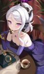  1girl absurdres antique_phone bare_shoulders black_horns blue_archive blue_gem blush breasts closed_mouth collarbone commentary cup dress elbow_gloves gem gloves halo highres hina_(blue_archive) hina_(dress)_(blue_archive) holding holding_phone horns indoors jewelry leaning_forward looking_at_viewer necklace official_alternate_costume official_alternate_hairstyle pearl_necklace pendant phone ponya_0000 purple_eyes purple_gloves rotary_phone saucer sitting small_breasts solo strapless strapless_dress tea teacup white_hair 