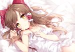  bed bow brown_hair close dress hakurei_reimu long_hair mochizuki_shiina nopan summer_dress touhou yellow_eyes 