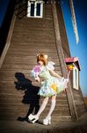  1girl asian card card_captor_sakura cosplay dress gloves high_heels kinomoto_sakura_(cosplay) knee_socks kneehighs magical_girl photo short_dress short_hair spiral_cats staff 