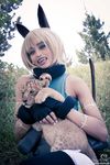  1girl bell bell_collar belt cat_ears cat_tail collar cosplay cub fangs female fingerless_gloves gloves lion lion_cub midriff ms._fortune_(skullgirls) nadia_fortune nadia_fortune_(cosplay) photo pouch scar skullgirls tail the_mirror_melts white_hair 