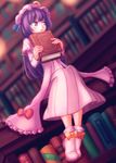  allen_(makaroll) bangs blue_ribbon blunt_bangs book bookshelf capelet commentary crescent double_bun dress frilled_dress frills hat highres holding holding_book library long_hair looking_to_the_side mob_cap open_mouth pajamas patchouli_knowledge purple_eyes purple_hair red_ribbon ribbon sitting solo touhou voile 