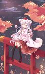  alternate_hairstyle animal_ears autumn autumn_leaves bare_shoulders black_legwear detached_sleeves extra_ears geta hand_on_own_chest hat highres inubashiri_momiji leaf long_hair nail_polish nature night night_sky niromi pom_pom_(clothes) red_eyes silver_hair sitting sitting_on_torii sky solo thighhighs tokin_hat torii touhou tree very_long_hair wolf_ears 