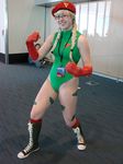  cammy_white cammy_white_(cosplay) capcom cellphone cosplay glasses highres iphone knee_boots leotard panties phone photo shoes smartphone sneakers street_fighter thong thong_leotard underwear 