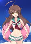  ahoge brown_eyes brown_hair commentary_request crop_top day groin innertube kantai_collection kuma_(kantai_collection) long_hair midriff navel ocean open_mouth short_shorts shorts sky sleeveless smile solo thigh_gap yoshiwo 