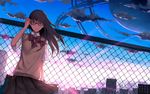  adjusting_hair bow bowtie brown_eyes brown_hair brown_skirt chain-link_fence cityscape cloud cowboy_shot dutch_angle fence glasses highres light_rays machinery original outdoors parted_lips pleated_skirt short_sleeves skirt solo sunlight suusuke sweater_vest 