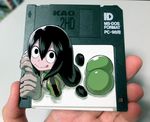  :&gt; ass asui_tsuyu black_eyes black_hair bodysuit boku_no_hero_academia brown_gloves eyelashes floppy_disk fourth_wall gloves long_hair murakami_hisashi photo pun solo tongue tongue_out 