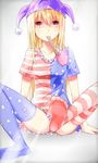  american_flag_dress american_flag_legwear blonde_hair blush clownpiece convenient_censoring convenient_leg feet gradient gradient_background hat he2kin jester_cap long_hair looking_at_viewer mouth_hold print_legwear red_eyes short_sleeves sitting smile solo star striped striped_legwear thighhighs touhou 