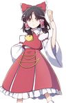  ascot black_hair bow brown_eyes detached_sleeves hair_bow hair_tubes hakurei_reimu ofuda ribbon shirt short_hair skirt skirt_set solo spell_card touhou wide_sleeves yutamaro 