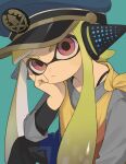  1girl agent_3_(splatoon) black_pants blue_background blue_hat blush_stickers bra_strap cloak closed_mouth commentary_request frown green_hair grey_shirt hand_on_own_cheek hand_on_own_face hat head_rest headphones highres inkling kyaiware layered_shirt long_hair long_sleeves military_hat multicolored_clothes pants peaked_cap red_eyes shirt simple_background solo splatoon_(series) splatoon_3 tentacle_hair thick_eyebrows torn_cloak torn_clothes twintails upper_body v-shaped_eyebrows 