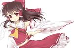  ascot blush bow brown_hair detached_sleeves gohei hair_bow hair_ribbon hair_tubes hakurei_reimu haruki_(colorful_macaron) large_bow navel no_bra red_eyes ribbon skirt skirt_set smile solo touhou vest 