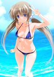  1girl bikini blue_bikini blue_eyes blush breasts brown_hair cleavage closed_mouth collarbone commentary_request corona_timir engo_(aquawatery) hair_ribbon highres in_water large_breasts long_hair looking_at_viewer lyrical_nanoha mahou_shoujo_lyrical_nanoha_vivid navel ocean outdoors ribbon sky solo swimsuit twintails 