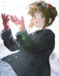  1girl antenna_hair black_coat brown_hair cardcaptor_sakura coat gloves hair_bobbles hair_ornament highres kinomoto_sakura lens_flare ling5707 open_mouth outdoors red_gloves short_hair snow solo standing winter_clothes 