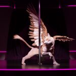 3d_(artwork) avian blender_(artwork) dancing digital_media_(artwork) eviltyto feathers feet female feral fur gryphon hi_res looking_at_viewer mythological_avian mythological_creature mythology quadruped raised_wings smile smiling_at_viewer smirk smirking_at_viewer strip_club talons teasing teasing_viewer toes wings