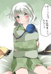  bad_id bad_pixiv_id checkered commentary green_eyes hammer_(sunset_beach) hat hat_removed headwear_removed komeiji_koishi looking_at_viewer on_bed pajamas pillow pillow_hug short_hair smile solo third_eye touhou translated 