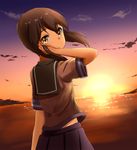  ame. brown_eyes brown_hair commentary_request cowboy_shot fubuki_(kantai_collection) kantai_collection looking_at_viewer looking_back outdoors school_uniform serafuku solo sunset water 