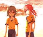  backlighting cowboy_shot green_hair grin inazuma_eleven_(series) inazuma_eleven_go kariya_masaki kirino_ranmaru long_hair male_focus multiple_boys pink_hair raimon raimon_soccer_uniform riho smile soccer_uniform sportswear twintails 