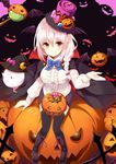  bad_id bad_pixiv_id bat_hair_ornament black_legwear blush boots braid candy cape center_frills commentary_request fang fang_out food from_above ghost hair_ornament halloween hat jack-o'-lantern long_hair looking_up original red_eyes ribbon silver_hair single_braid sitting skirt smile solo takehana_note thighhighs top_hat 