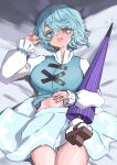  1girl blue_eyes blue_hair blue_skirt blue_vest closed_umbrella commentary_request heterochromia highres karakasa_obake long_sleeves looking_at_viewer lying midriff navel on_back open_mouth protectload purple_umbrella red_eyes shirt short_hair skirt smile solo tatara_kogasa thighs touhou umbrella vest white_shirt 