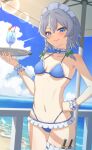  1girl absurdres alternate_costume beach bikini blue_bikini blue_eyes blue_sky blush bow braid breasts closed_mouth cloud commentary_request cup day drink drinking_glass drinking_straw frilled_bikini frilled_thigh_strap frills green_bow grey_hair hair_between_eyes hair_bow hand_on_own_hip highres holding holding_tray izayoi_sakuya knife lens_flare long_hair looking_at_viewer maid_headdress navel ocean outdoors shadow sky small_breasts smile solo stomach swimsuit tamahuku_0911 thigh_strap touhou tray twin_braids umbrella weapon_in_garters 