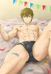  abs bangs bed_sheet brown_eyes brown_hair chachi_(soulga) confetti eyebrows eyebrows_visible_through_hair free! green_eyes kneehighs light_smile looking_at_viewer lying male_focus male_swimwear muscle nipples on_back on_bed pennant shirtless solo string_of_flags swim_briefs swimwear tachibana_makoto 