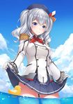  beret blue_eyes breasts buttons epaulettes gloves hat highres jacket kantai_collection kashima_(kantai_collection) kerchief large_breasts long_hair military military_uniform miniskirt ocean rubber_duck silver_hair skirt smile solo twintails uniform water wavy_hair white_gloves yuki_(clydtc) 