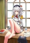  absurdres barefoot blue_eyes bottle breasts desk epaulettes hat highres kantai_collection kashima_(kantai_collection) looking_at_viewer map medium_breasts military military_uniform silver_hair skirt skirt_removed smile solo subber twintails uniform water_bottle 