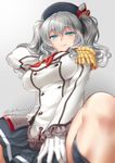  blue_eyes blurry breasts depth_of_field epaulettes gloves hat heart heart-shaped_pupils highres kantai_collection kashima_(kantai_collection) large_breasts looking_at_viewer military military_uniform miniskirt okitakung silver_hair skirt smile solo symbol-shaped_pupils twintails uniform 