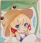 1girl blonde_hair blue_eyes blush brown_hat closed_mouth commentary hair_ribbon hat highres holding holding_umbrella leaf_umbrella long_sleeves looking_at_viewer moni_monico moriya_suwako photo_(medium) purple_vest red_ribbon ribbon shikishi smile solo tongue tongue_out touhou traditional_media tress_ribbon umbrella untranslatable_commentary vest wide_sleeves 