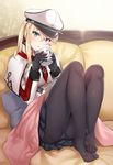  aldehyde blanket blonde_hair blue_eyes breasts capelet cup feet feet_together gloves graf_zeppelin_(kantai_collection) hat kantai_collection large_breasts long_hair looking_at_viewer mug no_shoes panties panties_under_pantyhose pantyhose peaked_cap skirt solo twintails underwear white_capelet 