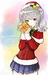  2015 aran_sweater ashiya_hiro bell blue_eyes box capelet dated fur_trim gift gift_box hair_bell hair_ornament hat holding holding_gift kantai_collection kashima_(kantai_collection) looking_at_viewer merry_christmas pleated_skirt santa_hat short_twintails silver_hair skirt smile solo sweater twintails wavy_hair 