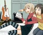  amplifier annoyed arashiyama_hotori bass_guitar blonde_hair brown_eyes brown_hair denim dress instrument jeans kon_futaba manga_(object) multiple_girls naotan pants pinafore_dress raglan_sleeves reading rug short_hair soredemo_machi_wa_mawatteiru striped striped_legwear thighhighs turtleneck zettai_ryouiki 