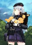  1girl beret carrying combat_knife dog face_licking forest german_flag german_shepherd girls_frontline green_eyes hat hessra highres hk416_(girls_frontline) holstered_weapon iron_cross knife licking magazine_(weapon) nature silver_hair smile weapon 