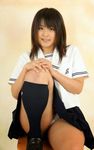  1girl japanese kneesocks panties photo school_uniform sitting solo thick_thighs underwear upskirt 