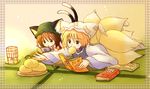  animal_ears baozi blonde_hair book brown_eyes brown_hair cat_ears cat_tail chen eating eijima_moko food fox_tail handheld_game_console mouth_hold multiple_girls multiple_tails nintendo_ds playing_games tail touhou yakumo_ran 