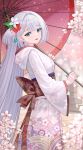  1girl azur_lane blue_eyes cherry_blossom_print cherry_blossoms earrings falling_petals floral_print flower from_side grey_hair hair_flower hair_intakes hair_ornament hairpin highres japanese_clothes jewelry kanzashi kimono long_hair long_sleeves looking_at_viewer obi obiage oil-paper_umbrella open_mouth petals pink_kimono sash shoukaku_(azur_lane) smile solo standing stone_lantern tina_(tinafya) umbrella very_long_hair wide_sleeves 