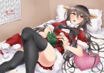  1girl bed black_hair black_ribbon black_thighhighs blush box breasts calendar_(object) capelet christmas cleavage commentary_request confetti crop_top english_text fur-trimmed_capelet fur-trimmed_skirt fur_trim gift gift_box hair_between_eyes hair_ornament haruna_(kancolle) hat heart heart-shaped_box heart-shaped_pillow highres holding holding_gift jewelry kantai_collection long_hair looking_at_viewer lying on_back open_mouth otobi pillow pink_nails ribbon ring santa_costume santa_hat skirt small_breasts smile solo thighhighs thighs translation_request yellow_eyes 