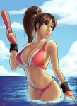  1girl adapted_costume artist_request bare_shoulders bikini breasts brown_eyes brown_hair cleavage fatal_fury fatal_fury_2 hand_fan highres holding holding_fan large_breasts long_hair midriff navel ocean ponytail red_bikini red_lips shiranui_mai signature snk solo stomach swimsuit the_king_of_fighters thighs water wet 