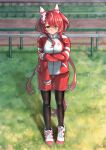  1girl animal_ears blurry blurry_background closed_mouth commentary_request fence full_body grass green_eyes hair_between_eyes hair_ornament highres horse_ears horse_girl horse_tail jacket long_hair looking_at_viewer low_twintails noshiro_pixv pantyhose pout red_hair shoes shorts solo standing tail track_jacket twintails umamusume win_variation_(umamusume) 