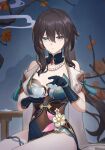  1girl absurdres bare_shoulders bead_necklace beads black_gloves black_hair blue_dress blue_eyes breasts brown_hair cleavage closed_mouth covered_navel cresmsilet cup detached_collar dress elbow_gloves flower gloves hair_between_eyes hair_ornament highres holding holding_cup honkai:_star_rail honkai_(series) indoors jewelry large_breasts long_hair necklace ruan_mei_(honkai:_star_rail) solo teacup teapot thighs 