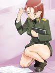  book em hair_flip long_hair looking_down military military_uniform minna-dietlinde_wilcke paper red_hair solo squatting strike_witches uniform world_witches_series 