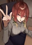  1girl :d absurdres aketa_mikoto black_pants blonde_hair blush breasts brown_hair chain chain_necklace commentary_request fingernails grey_sweater highres idolmaster idolmaster_shiny_colors indoors jewelry long_sleeves looking_at_viewer medium_breasts mitei_(illust_ro) nail_polish necklace pants ribbed_sweater sitting smile solo sweater w 