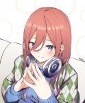 1girl absurdres bangs blue_eyes blue_sweater blush breasts closed_mouth commentary_request eyebrows_visible_through_hair fingernails fingers fingers_together go-toubun_no_hanayome hair_between_eyes headphones headphones_around_neck highres ky_(ky990533) long_hair long_sleeves looking_at_viewer nakano_miku red_hair smile solo sweater upper_body 