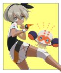  1girl ^_^ absurdres bea_(pokemon) black_hairband border clenched_hand clobbopus closed_eyes closed_mouth commentary_request dark-skinned_female dark_skin dynamax_band ebiura_akane eyelashes gloves grey_eyes grey_hair hairband highres knee_pads pokemon pokemon_(creature) pokemon_swsh shirt short_hair short_sleeves shorts simple_background single_glove star_(symbol) white_border white_shorts yellow_background 