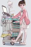  1girl badge blue_eyes breasts brown_hair button_badge cable cardigan cart character_badge collared_dress computer copyright_name doraemon doraemon_(character) drawer dress from_side full_body grey_background hair_bun highres holding id_card iv_stand laptop long_sleeves looking_to_the_side nurse office_lady_taiwan open_cardigan open_clothes pantyhose parted_lips pink_cardigan revision shadow shoes short_dress short_hair sidelighting simple_background single_hair_bun small_breasts sneakers solo standing standing_on_one_leg tennohi tissue_box trash_can turning_head watch white_dress white_pantyhose white_shoes wristwatch 
