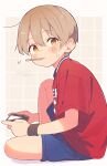  1boy blue_shorts brown_hair child dated facial_mark far_tarooo full_body handheld_game_console highres holding holding_handheld_game_console male_focus marking_on_cheek mouth_hold original popsicle_stick red_shirt rotto_(far_tarooo) shirt short_hair short_sleeves shorts sitting solo sweatband wristband yellow_eyes 