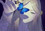  1girl blue_butterfly bug butterfly commentary dark_background grey_eyes grey_hair grin hair_ornament hand_up highres holding_butterfly long_hair long_sleeves lorentz_butterfly m_ccc_chi mole mole_under_eye one_eye_covered portrait reverse:1999 smile solo untranslatable_commentary 