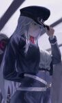  1girl 86_-eightysix- absurdres arm_behind_back belt blue_jacket blue_skirt closed_mouth colored_eyelashes commentary grey_eyes grey_hair hair_between_eyes hand_on_headwear harstor hat high-waist_skirt highres indoors jacket long_hair long_sleeves military_hat military_jacket military_uniform o-ring o-ring_belt peaked_cap shirt single_hair_streak skirt solo very_long_hair vladilena_millize white_shirt 