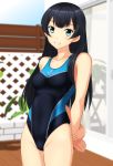  1girl absurdres agano_(kantai_collection) anchor_print black_hair blue_eyes blue_swimsuit breasts competition_swimsuit covered_navel cowboy_shot fence highleg highleg_swimsuit highres kantai_collection long_hair multicolored multicolored_clothes multicolored_swimsuit one-piece_swimsuit small_breasts solo standing swimsuit takafumi 