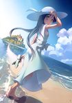  absurdres armpits barefoot beach black_hair breasts brown_eyes cloud day dress dutch_angle feet hand_on_headwear hat highres holding holding_shoes long_hair looking_back mont_st-michel no_bra ocean original outdoors sandals shoes sideboob sky small_breasts solo sun_hat sundress takoyaki_(roast) town water 